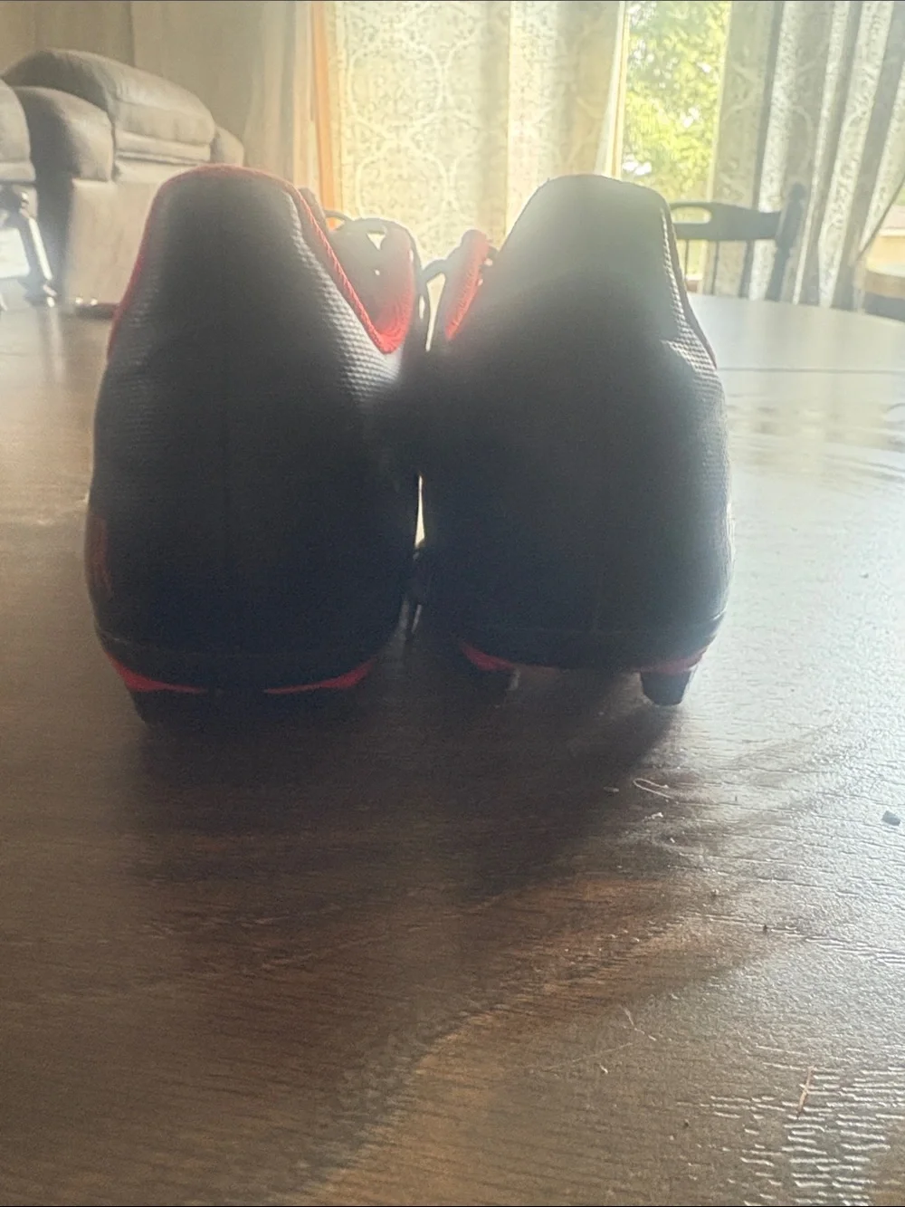 adidas Men’s Black Soccer Shoes with Red Lining and White Stripes